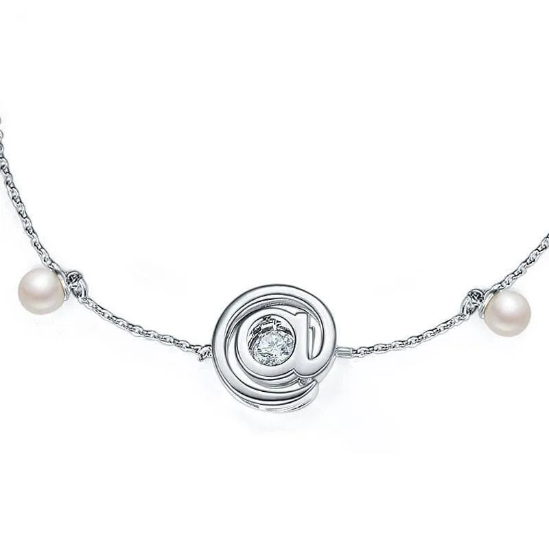 @ Symbol Dancing Diamond with Fresh Water Pearls Bracelet