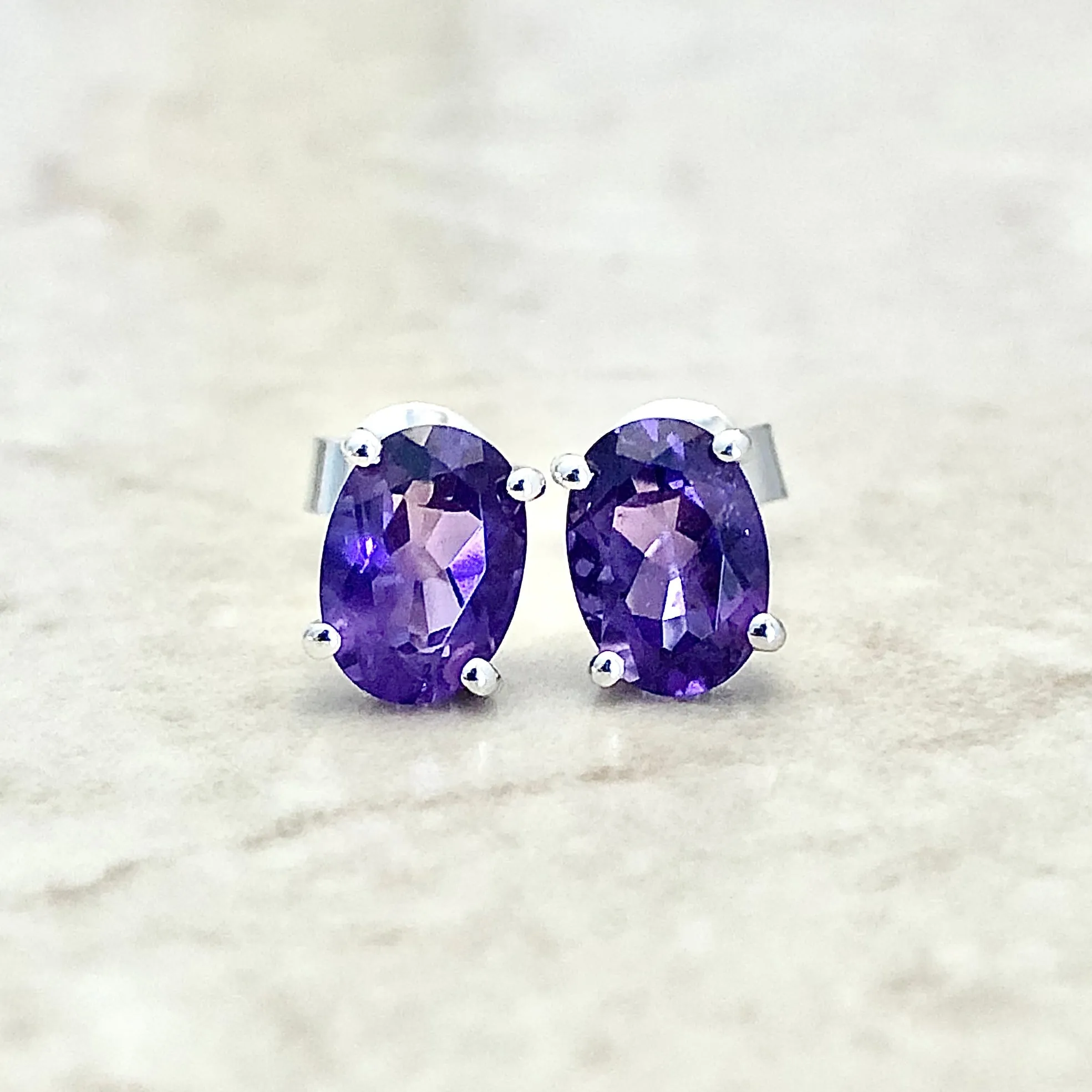 14 Karat White Gold February Birthstone Oval Amethyst Stud Earrings