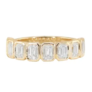 14kt gold emerald cut diamond bezel band