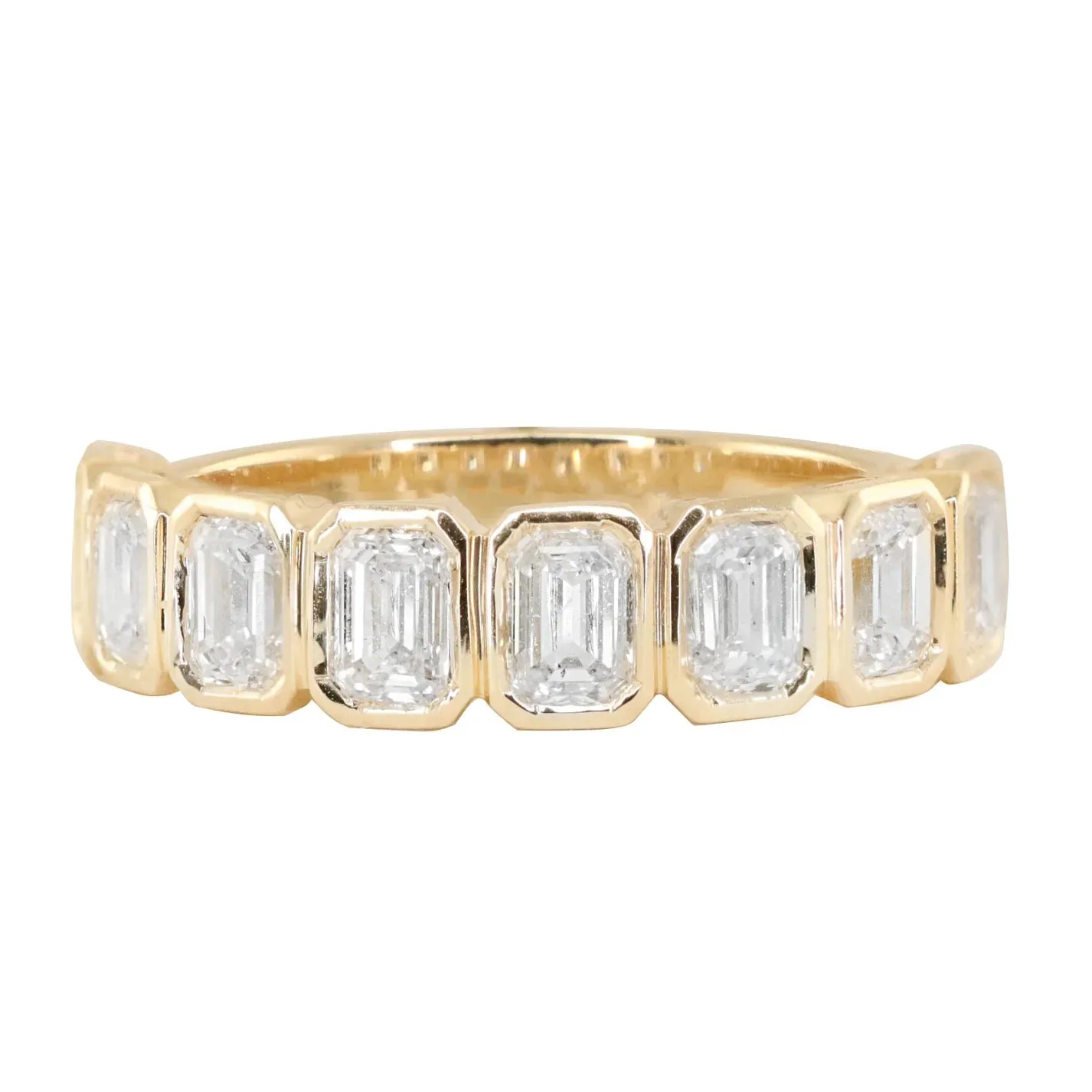 14kt gold emerald cut diamond bezel band