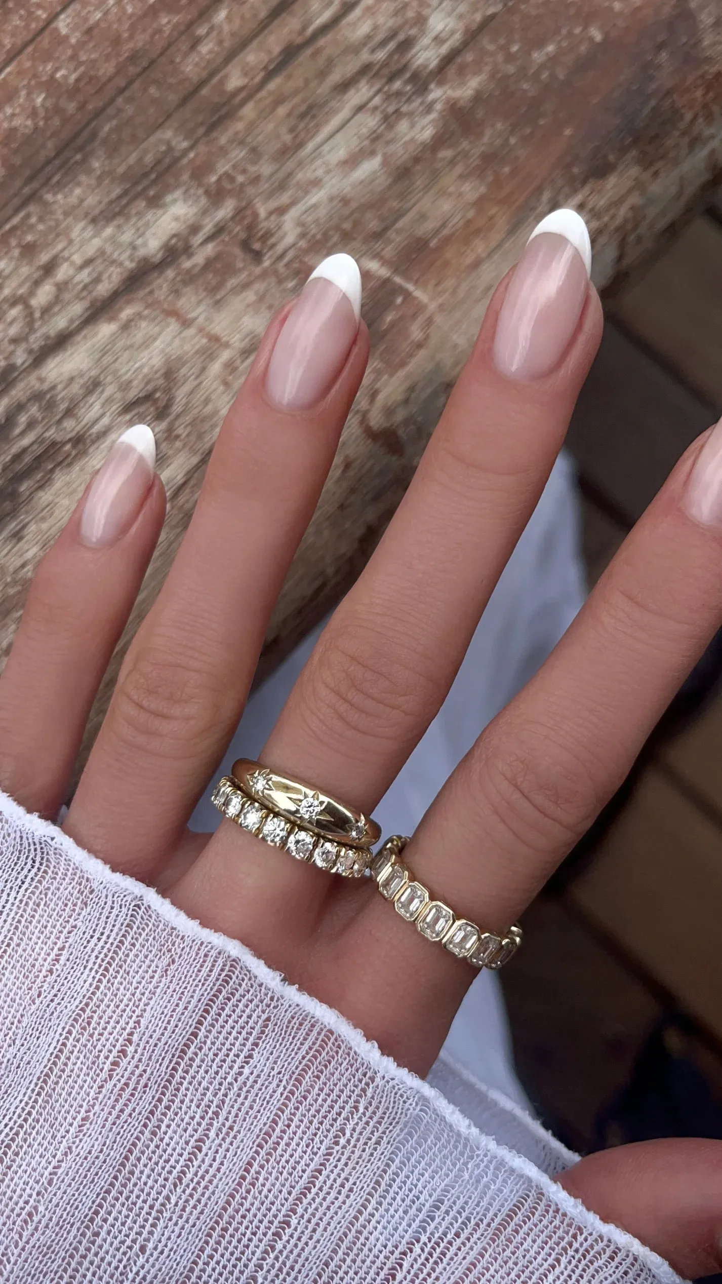 14kt gold emerald cut diamond bezel band