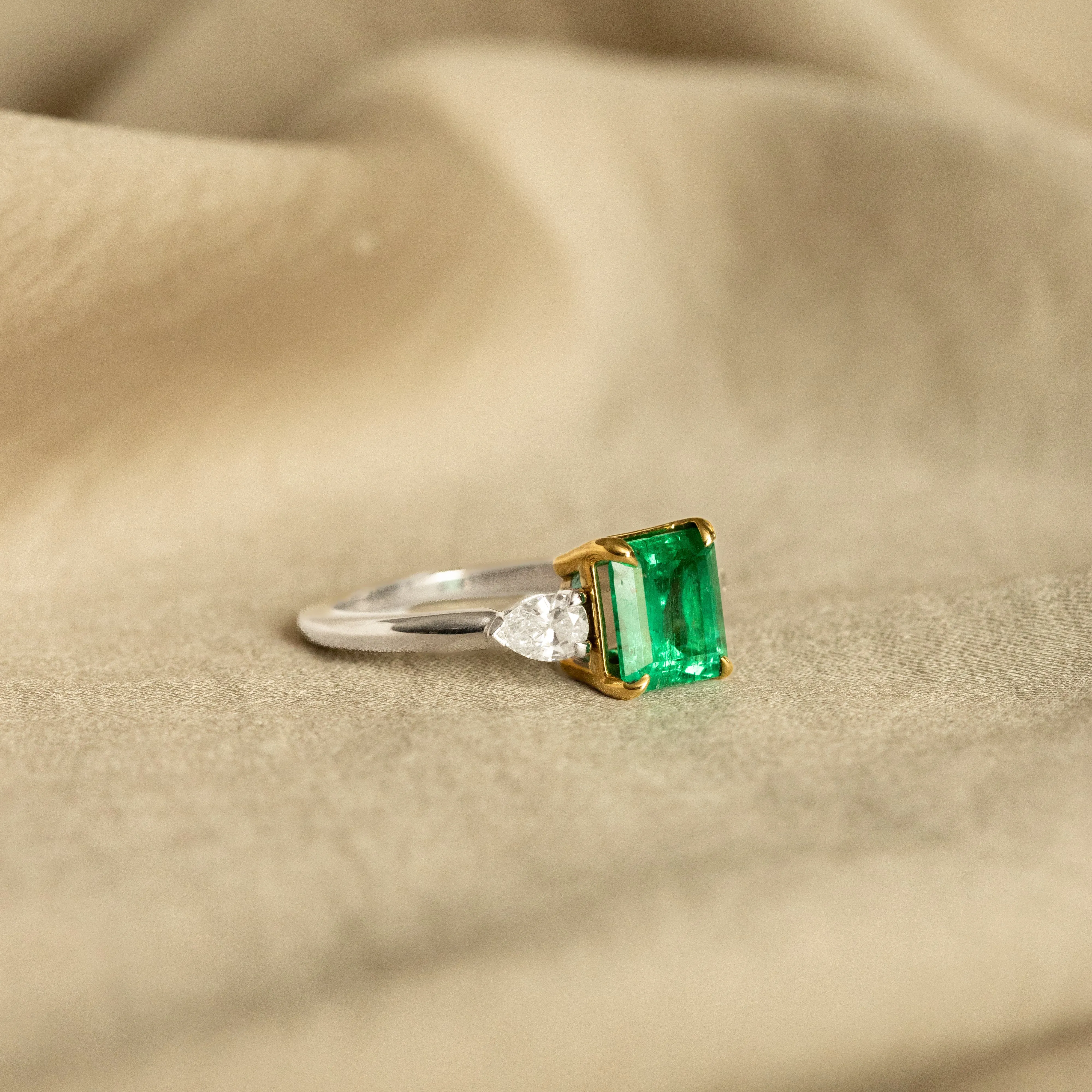 1.85 Carat Colombian Emerald Pear Diamond Three Stone Ring