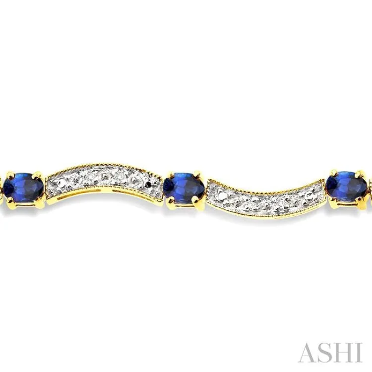 4x3mm Oval Cut Sapphire and 1/10 Ctw Single Cut Diamond Bracelet in 14K Yellow Gold