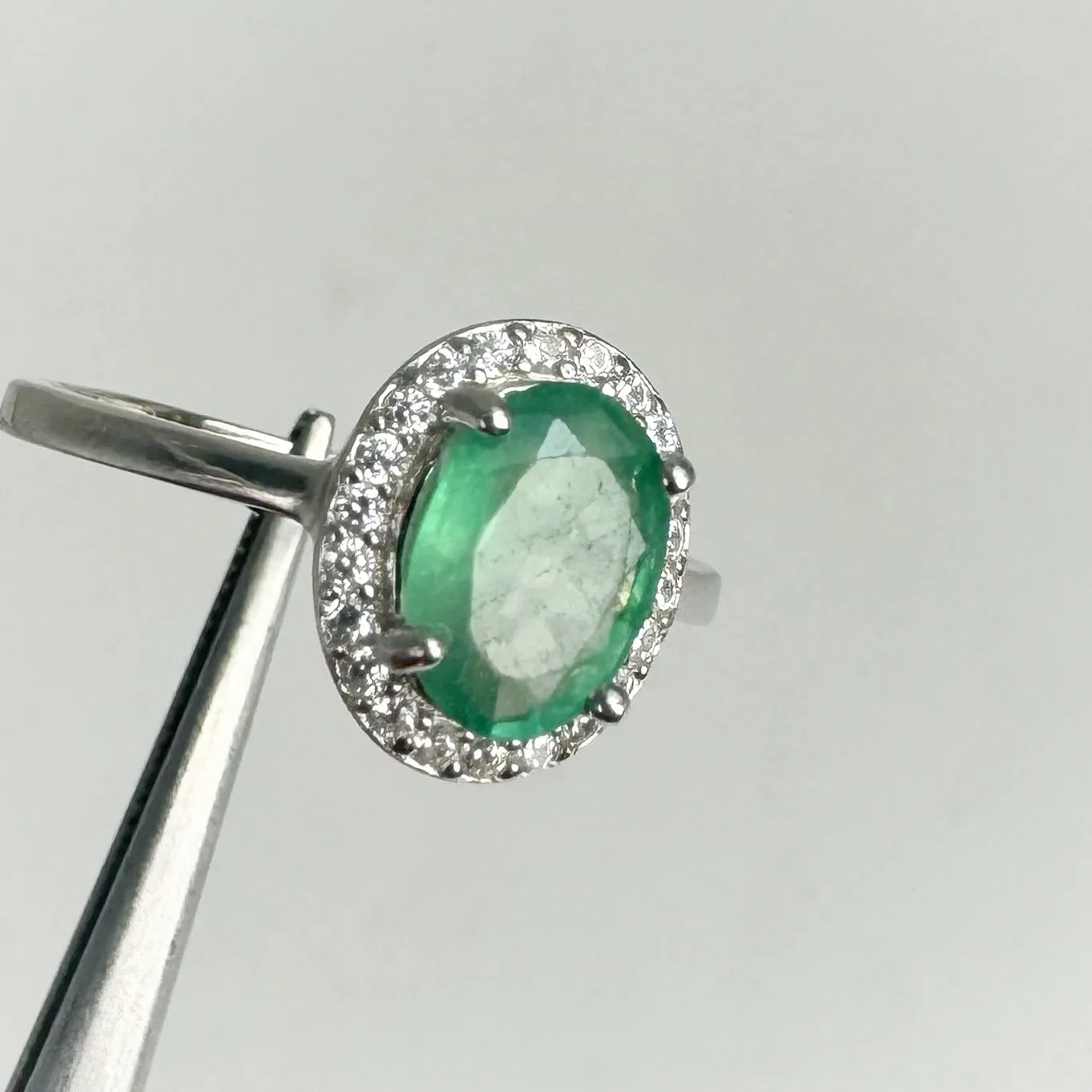6 x 8 mm. Oval Cut Green Zambian Emerald with Cz Halo Ring
