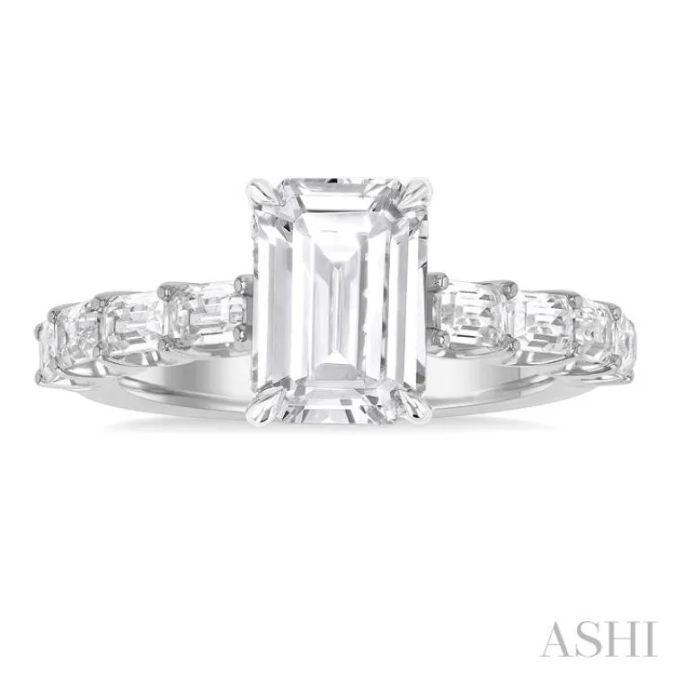 7/8 ctw Emerald Shape Emerald and Round Cut Diamond Semi Mount Engagement Ring in 14K White Gold
