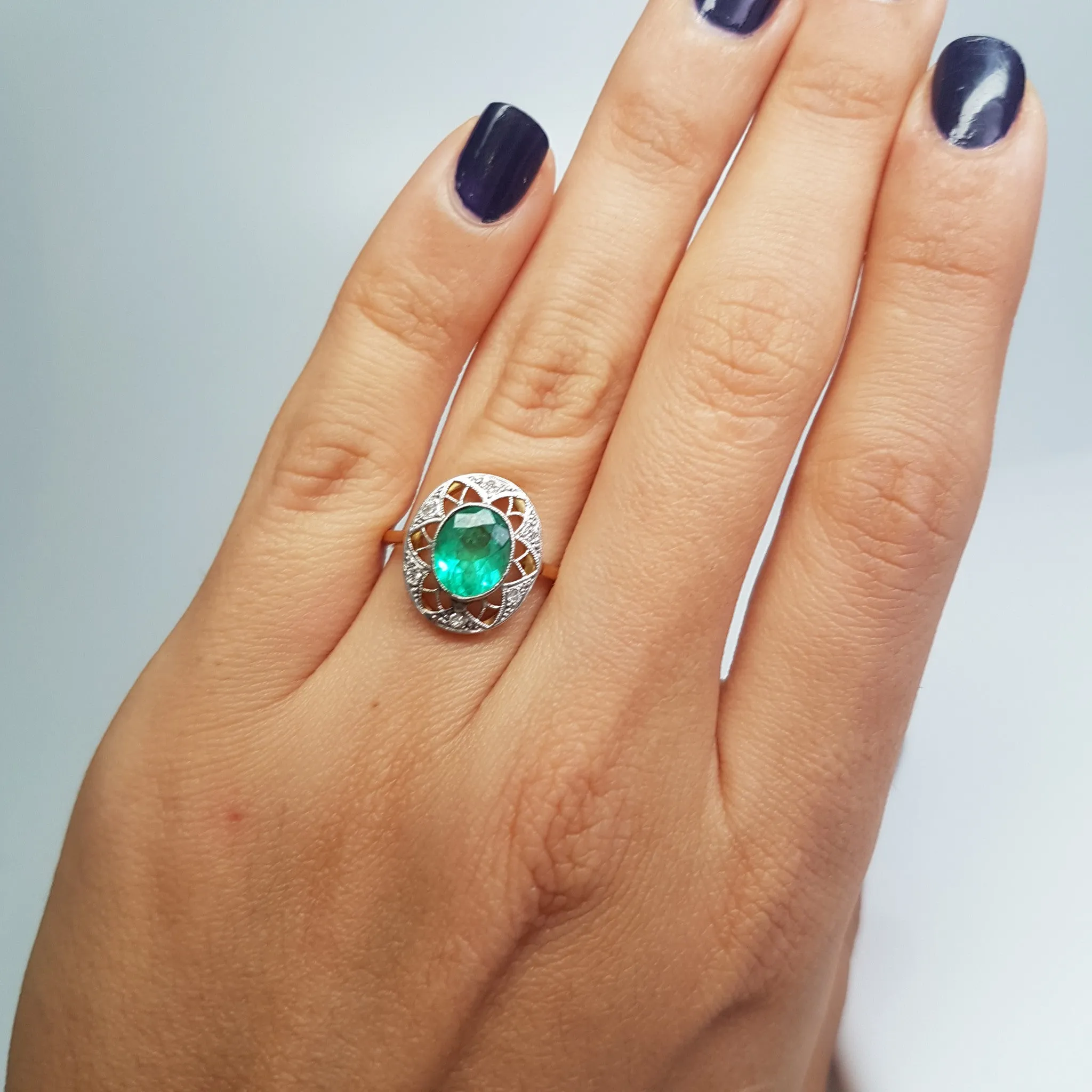 ANTIQUE NOUVEAU EMERALD AND DIAMOND RING