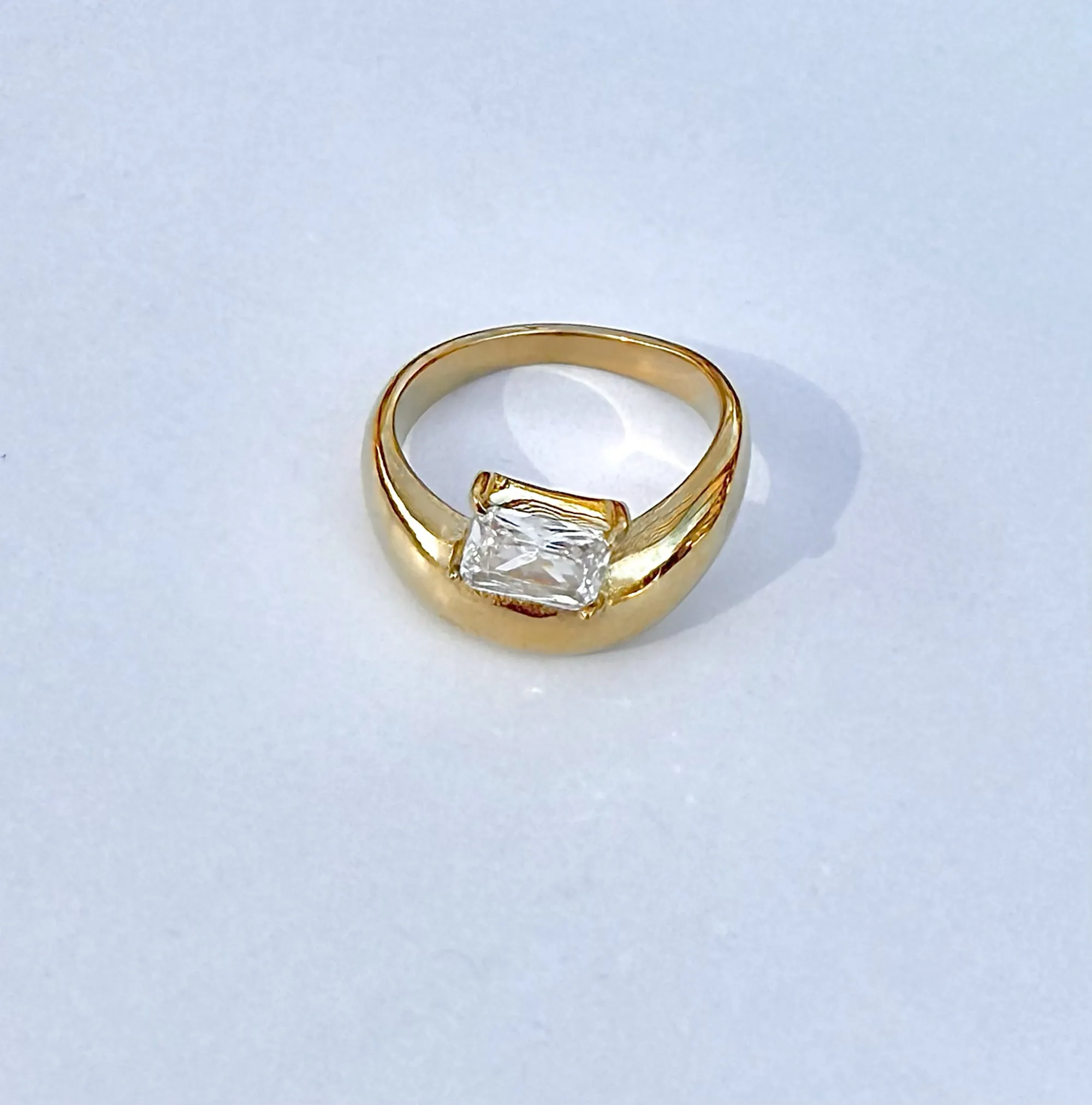 ASTRID GOLD EMERALD SOLITAIRE ASYMMETRICAL DOME RING