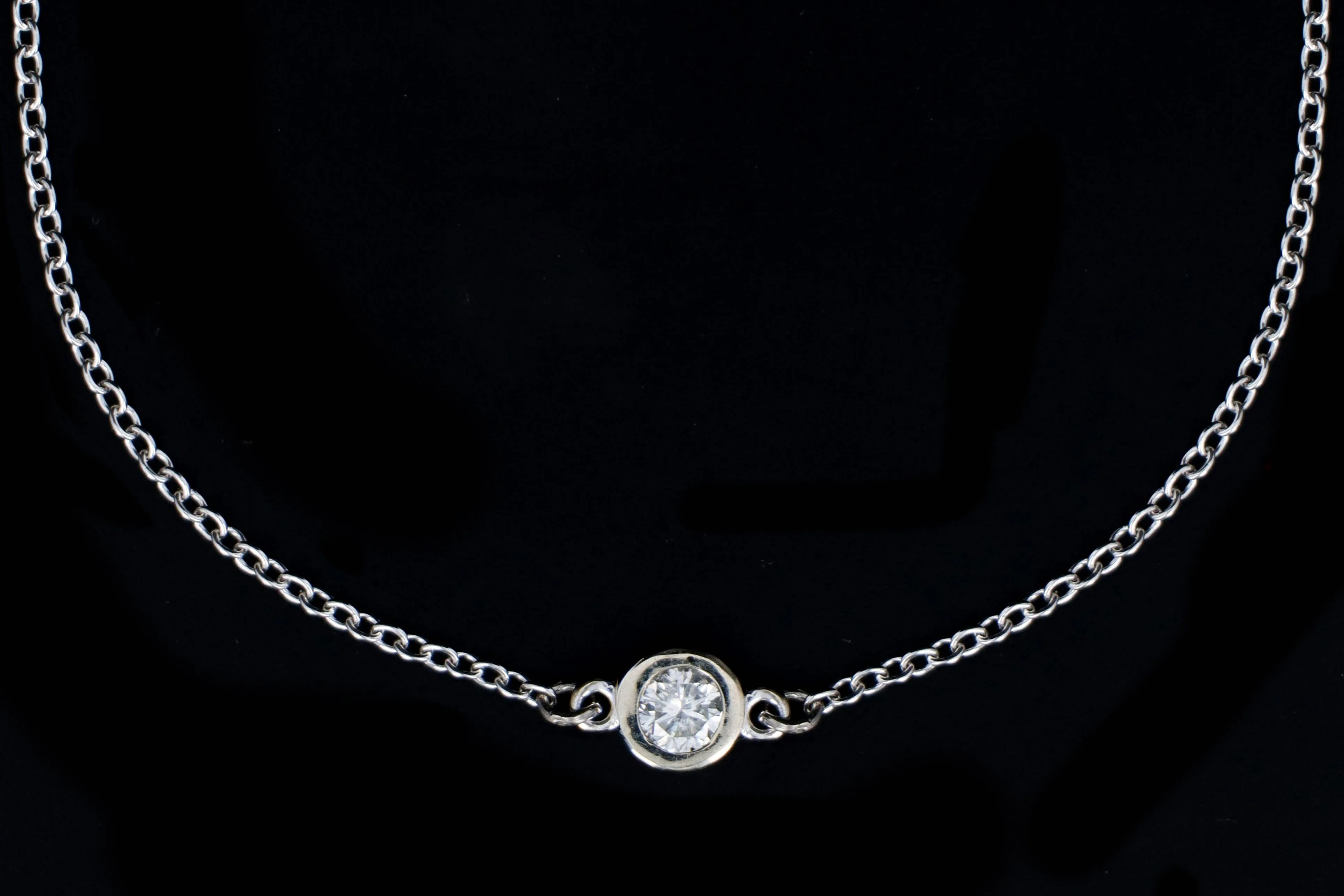 Modern 18K White Gold .15 Carat Round Brilliant Cut Bezel Set Diamond Bracelet