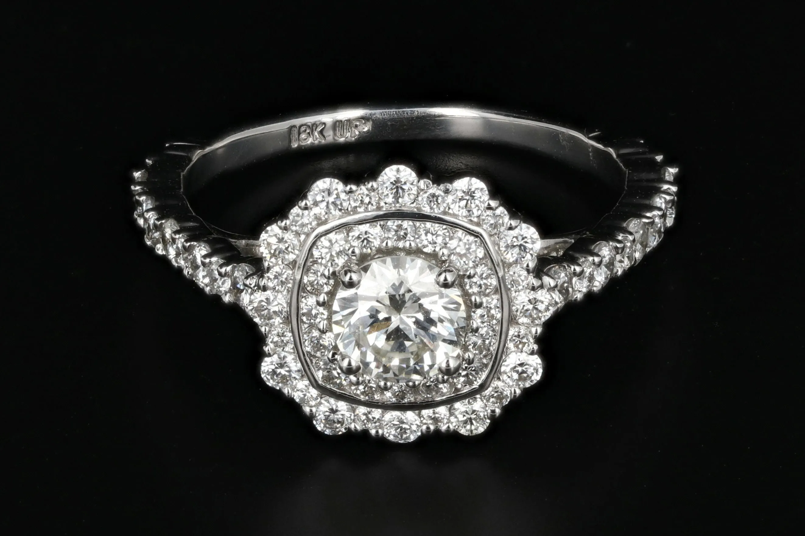 Modern 18K White Gold .50 Carat Diamond Halo Engagement Ring