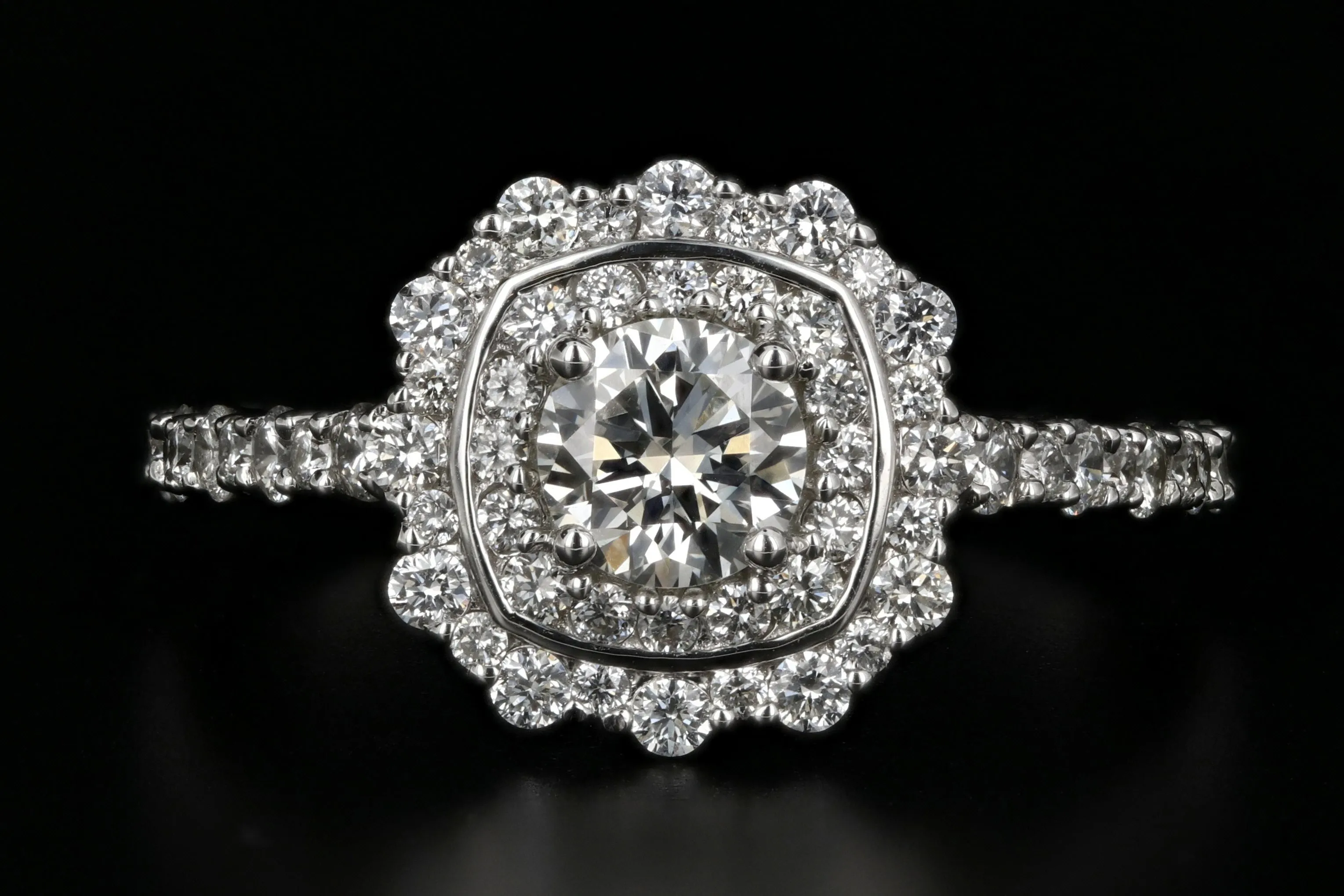 Modern 18K White Gold .50 Carat Diamond Halo Engagement Ring