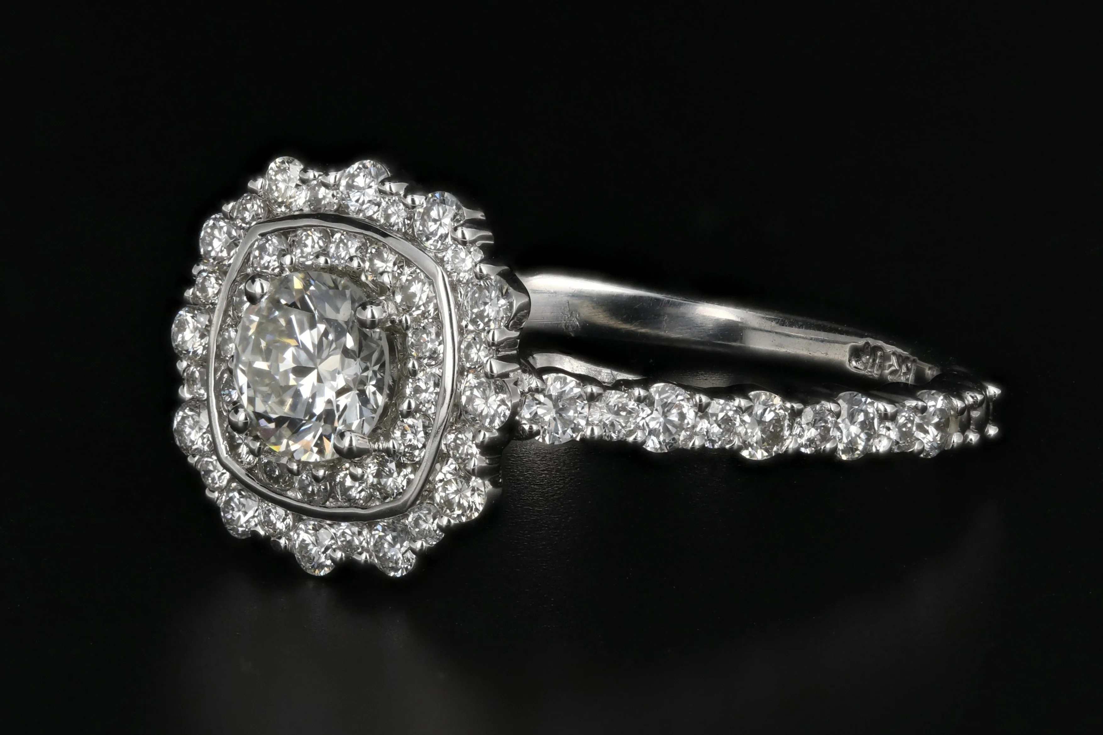 Modern 18K White Gold .50 Carat Diamond Halo Engagement Ring