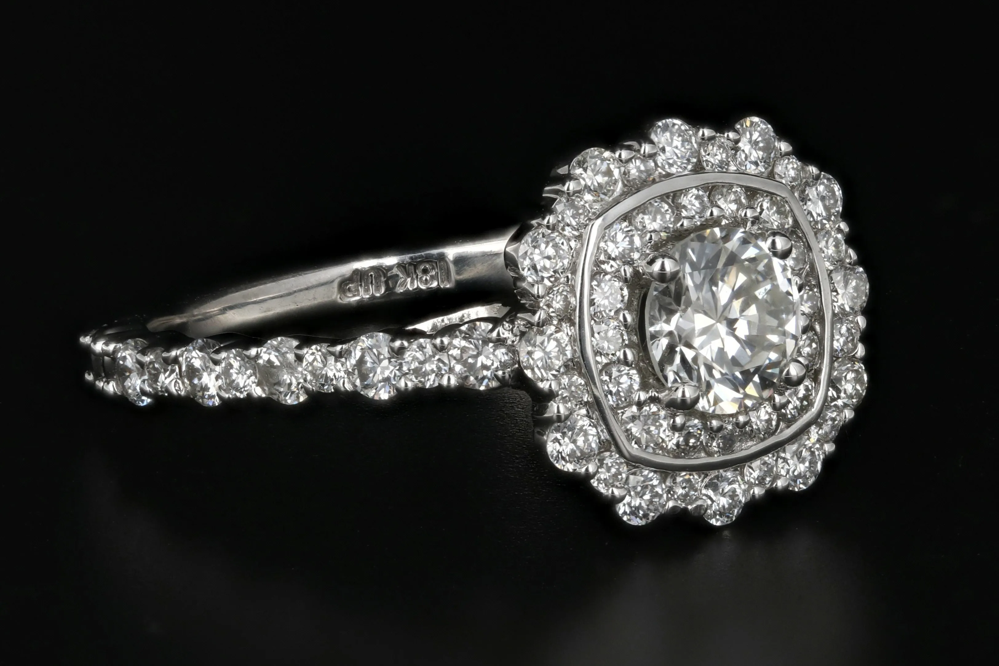 Modern 18K White Gold .50 Carat Diamond Halo Engagement Ring