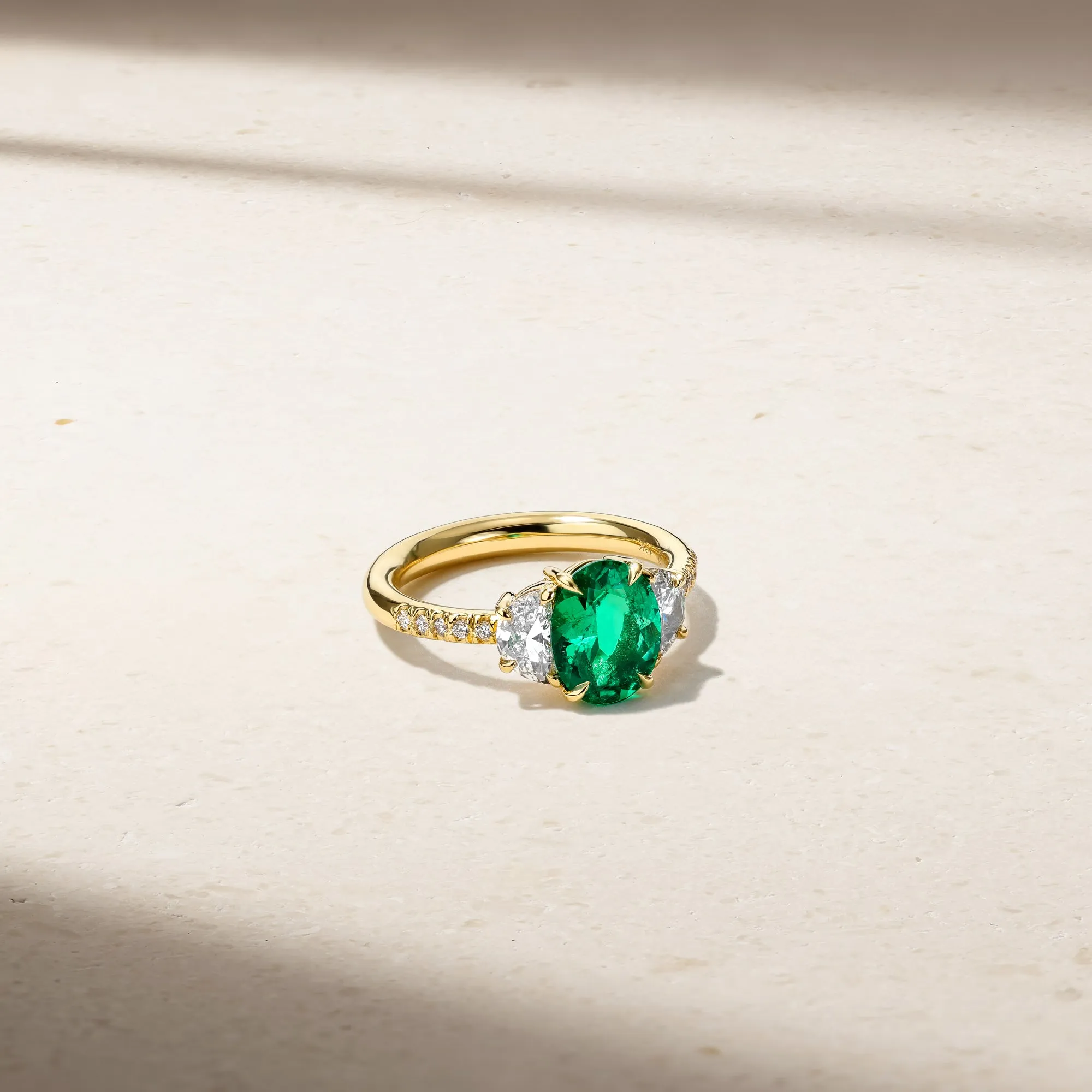 Nouveau Three Stone Oval Emerald and Diamond Ring