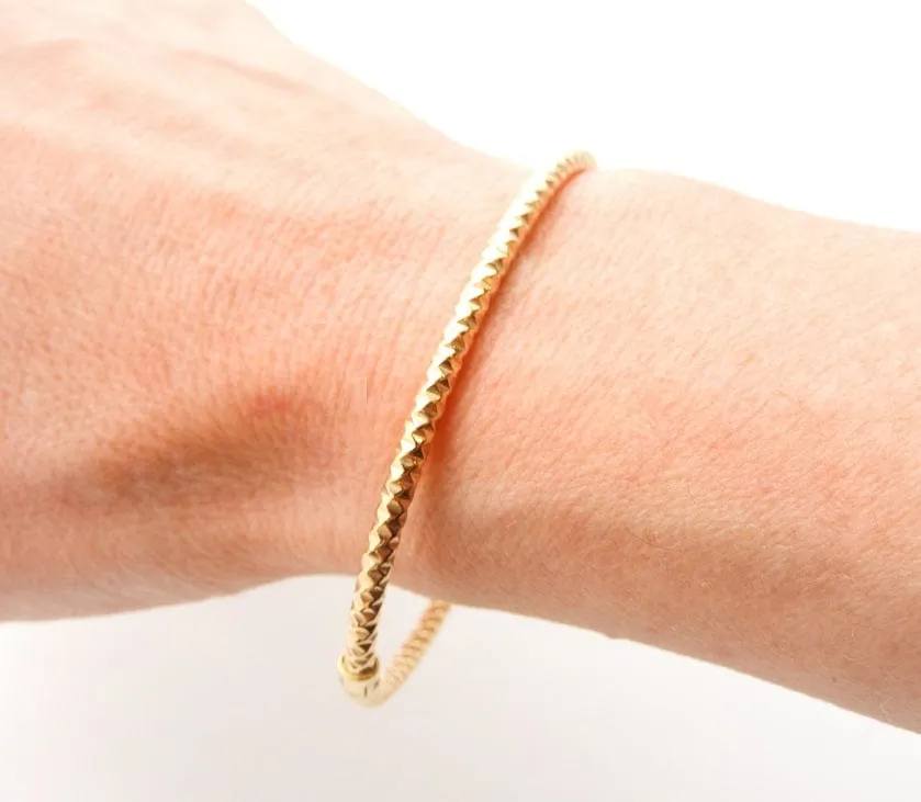 Rich 14K Yellow Gold Hinged Diamond Cut Bangle