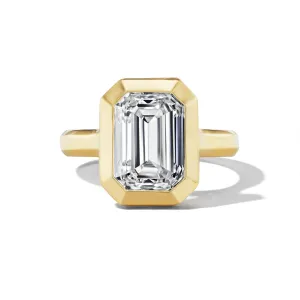 SHIELD BEZEL SET EMERALD CUT DIAMOND ENGAGEMENT RING
