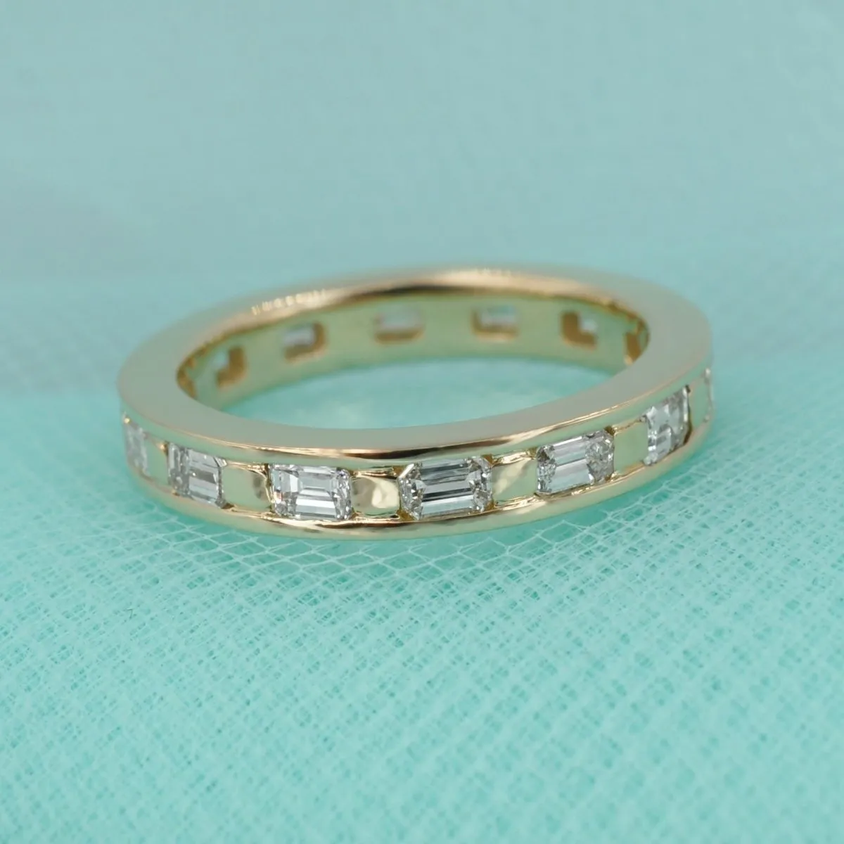 Stunning 2.50 CT Emerald Cut Diamond Eternity Ring in 14KT Yellow Gold