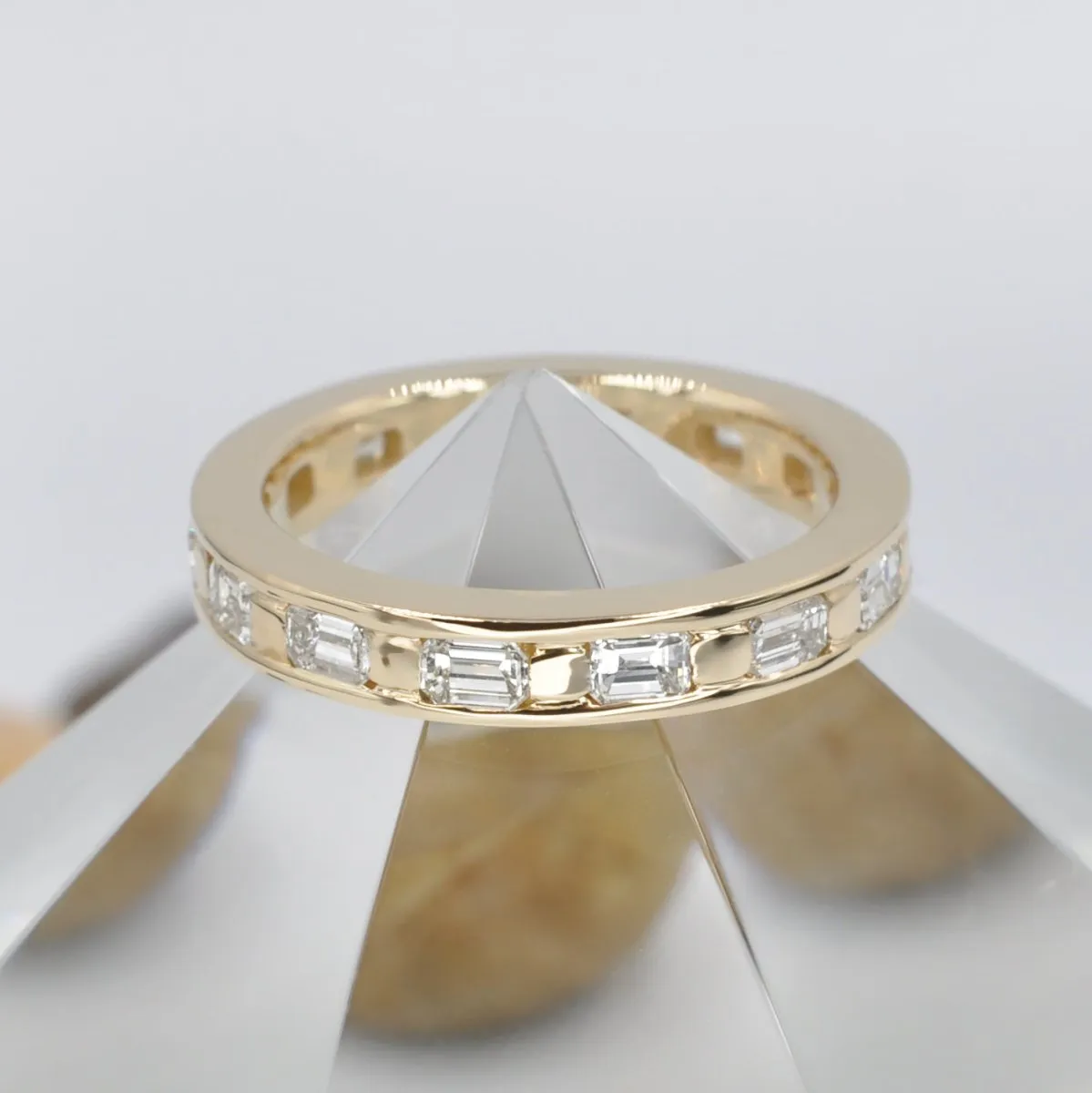 Stunning 2.50 CT Emerald Cut Diamond Eternity Ring in 14KT Yellow Gold