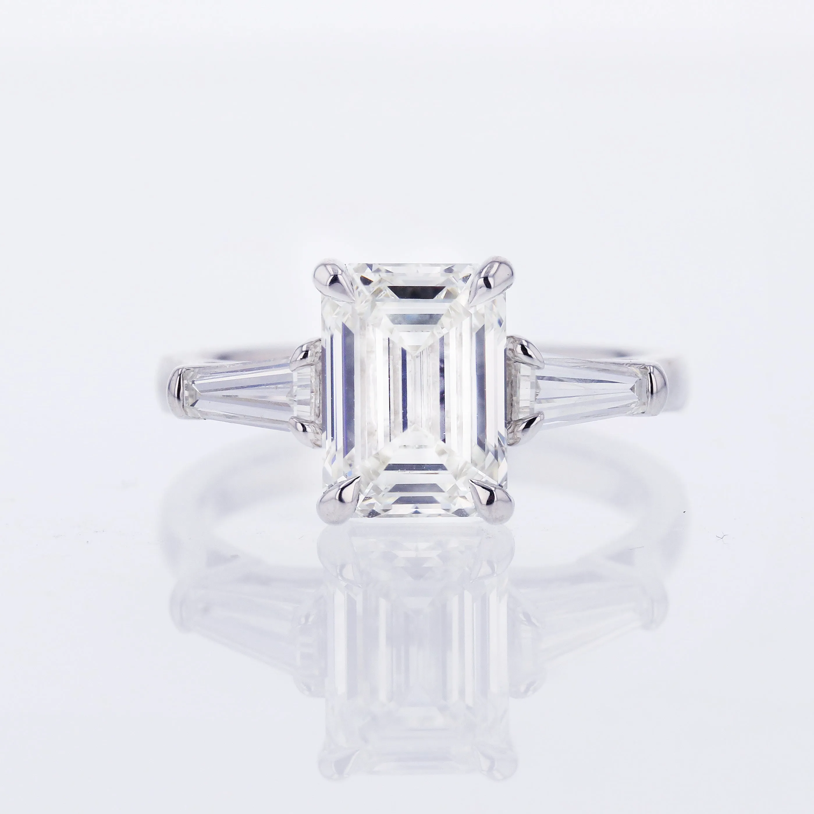 Three-stone Emerald Engagement Ring